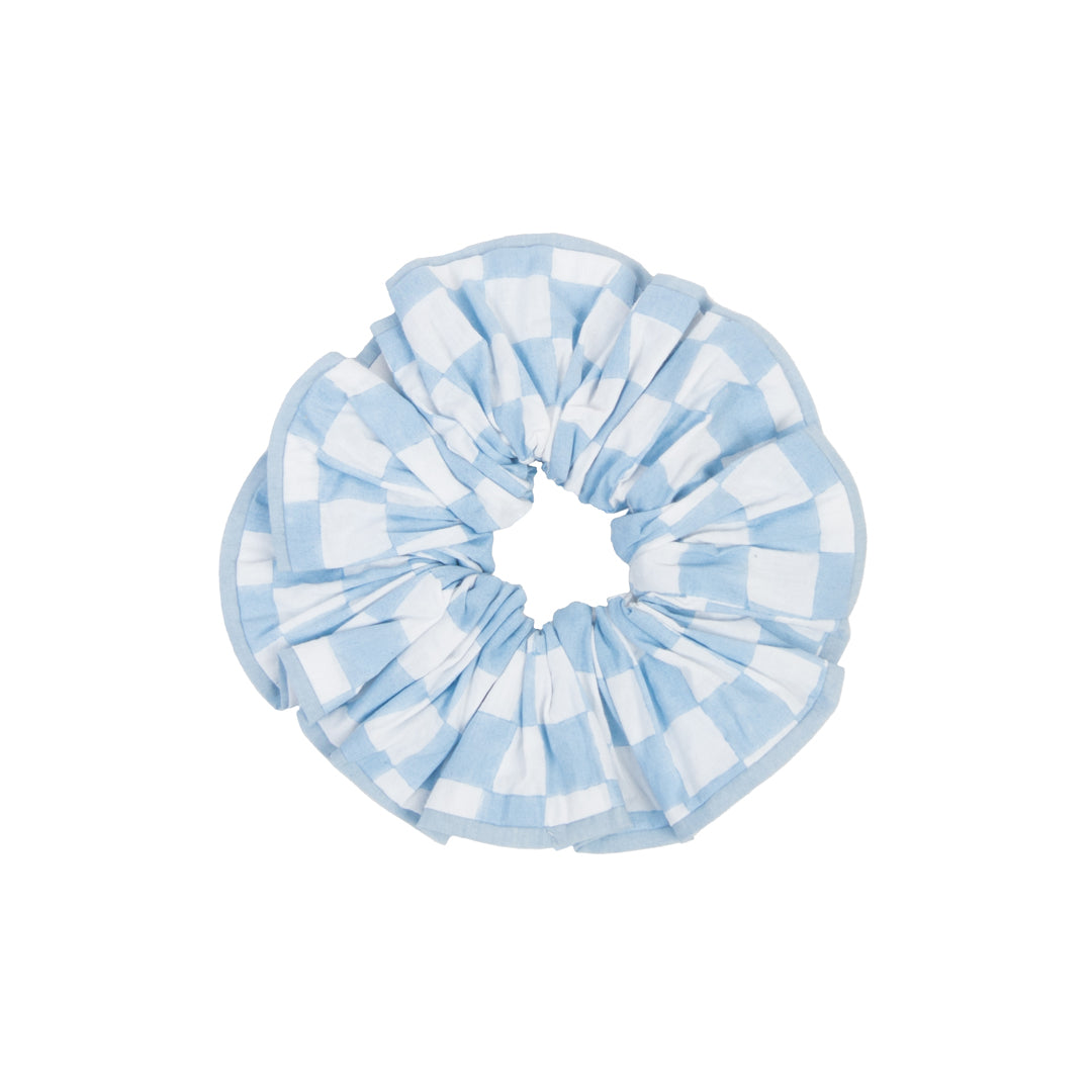 Blue and white striped scrunchie on a white background