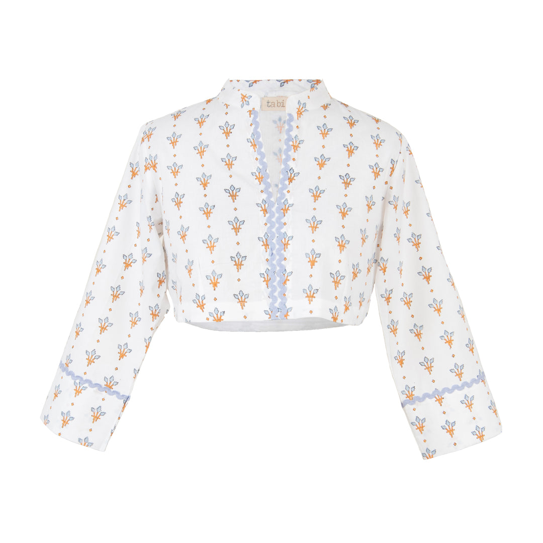White crop top with floral pattern on a white background