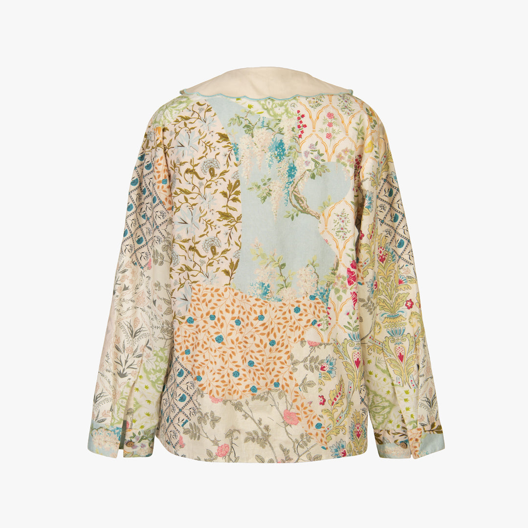 Floral patterned blouse on a white background