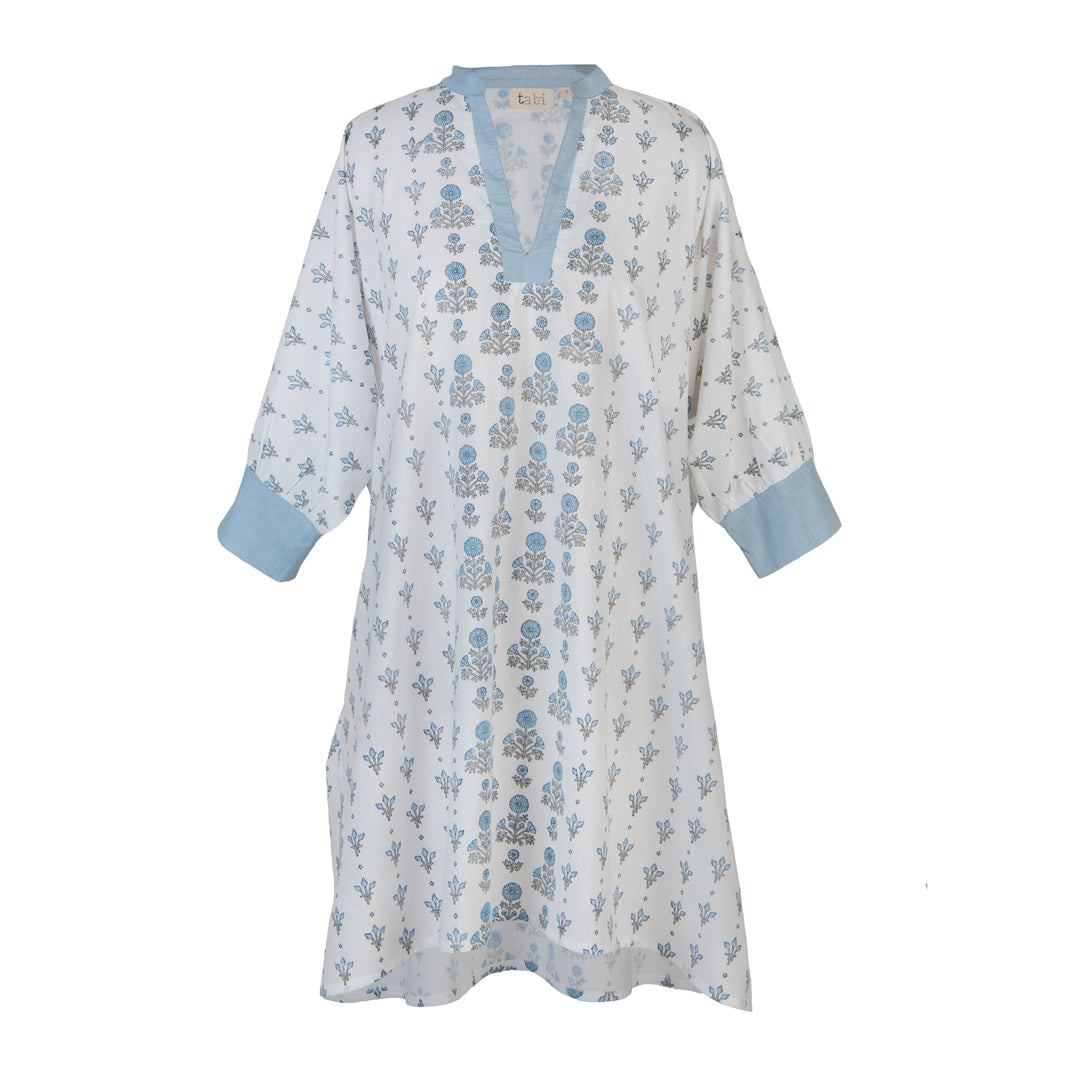 White dress with blue floral pattern on a white background