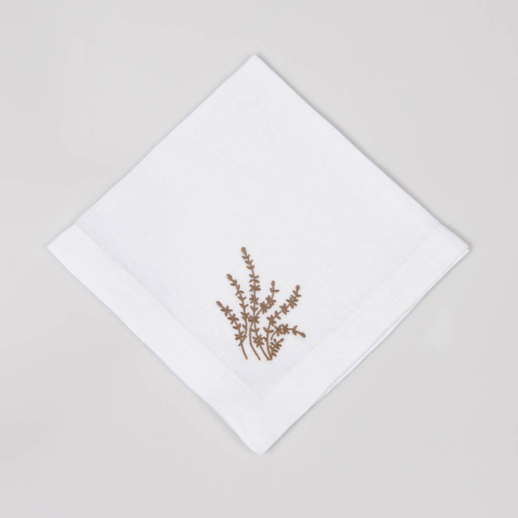 Embroidered white linen napkins