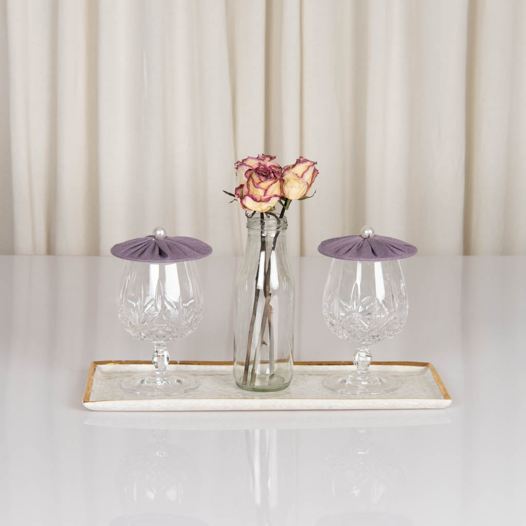 Glass covers in amethyst smoke linen with pearl bead handle