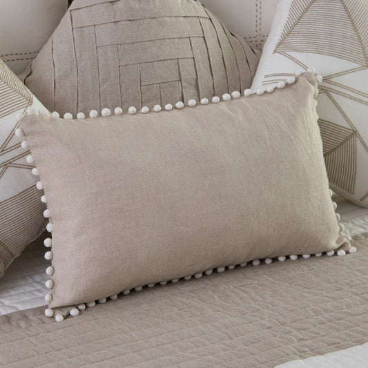 Dhari natural linen cushion cover with pompoms