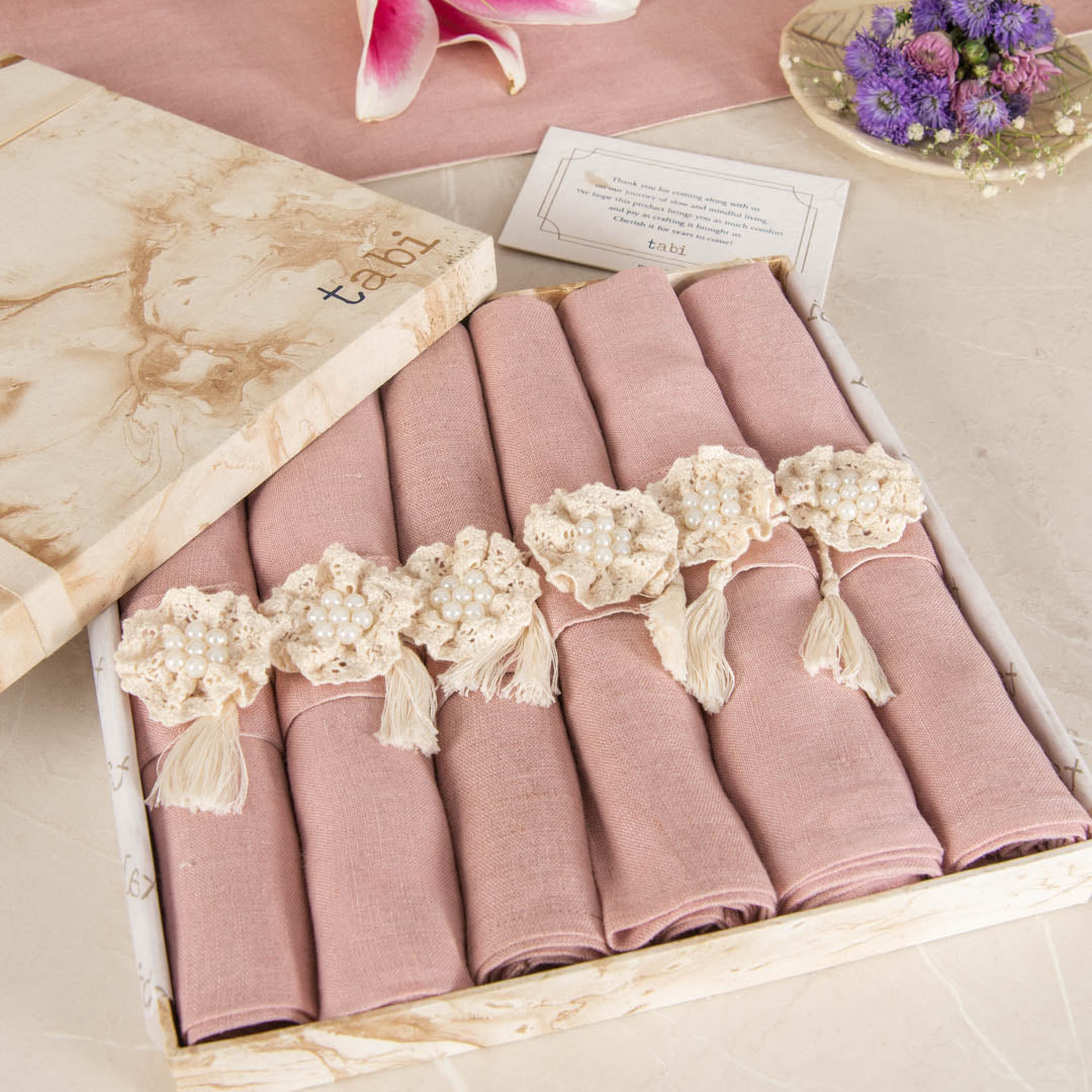 Sutton napkins and napkin rings