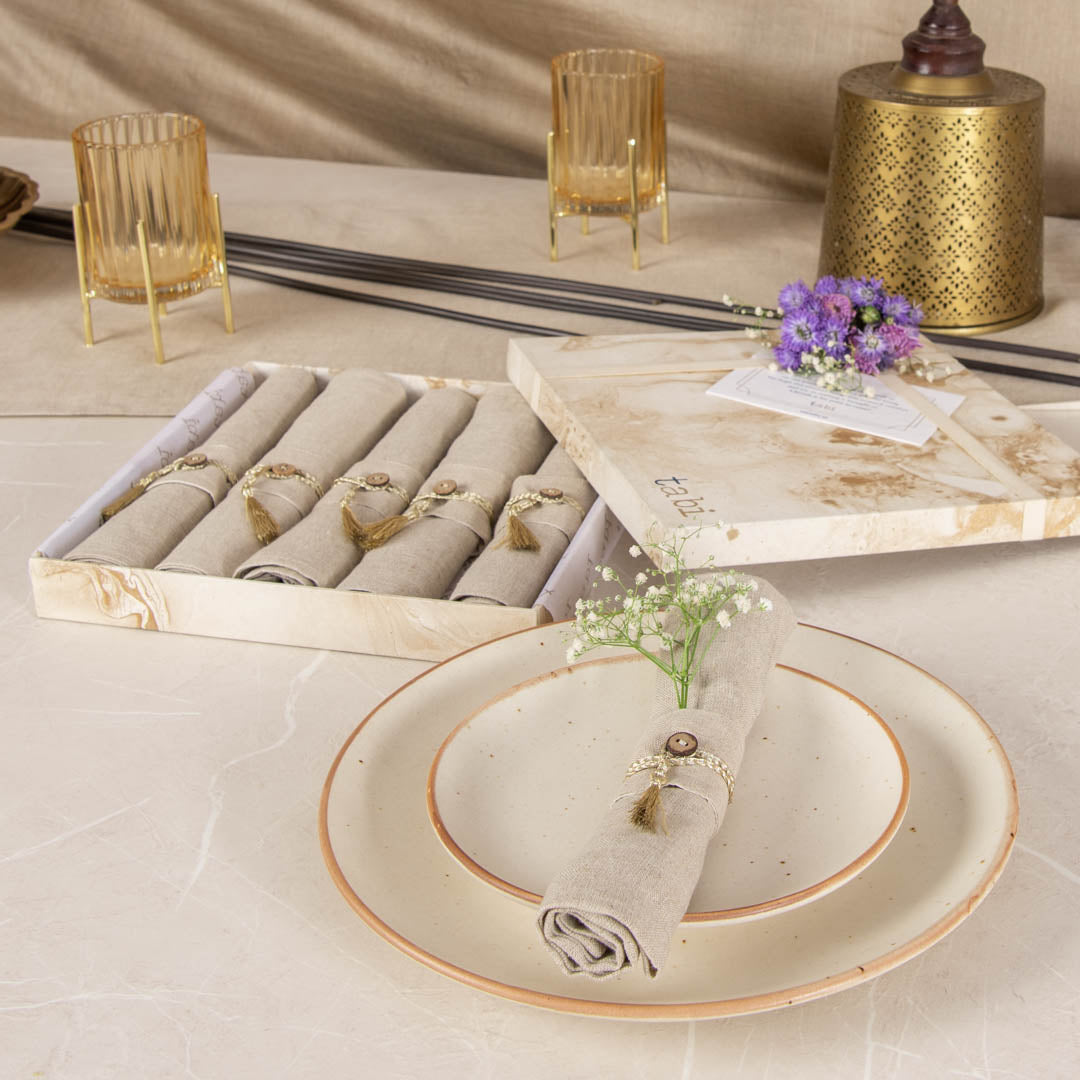 Natural dinner napkins and napkin rings