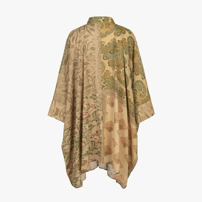 Beige floral patterned shawl on a white background