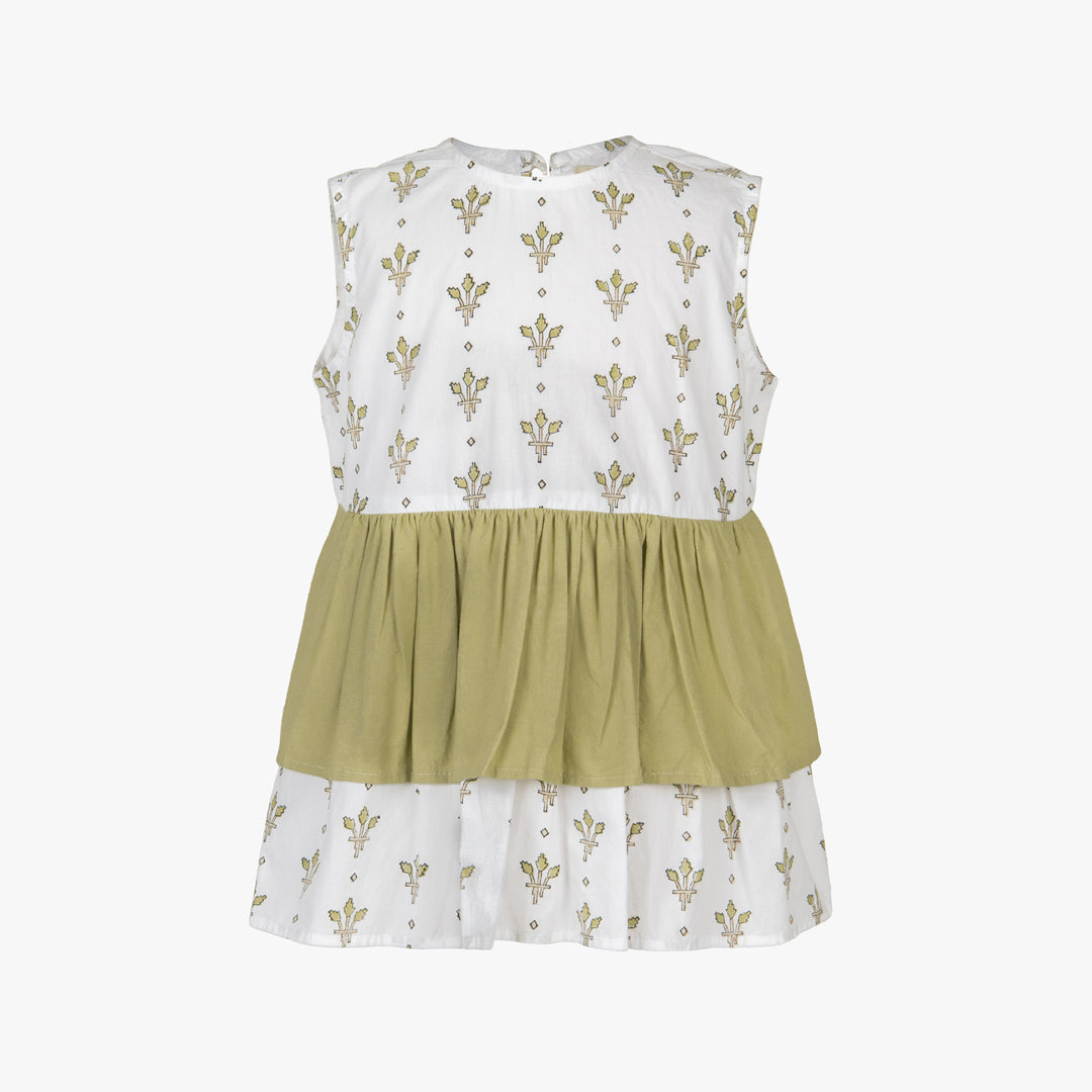 Two-tone dress with top half in white and bottom half in green on a white background