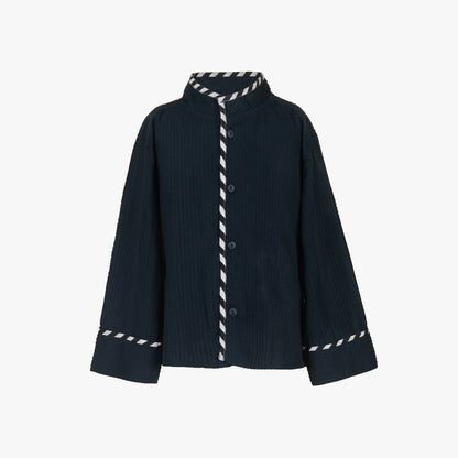 Dark blue ribbed sweater with white striped trim on a white background