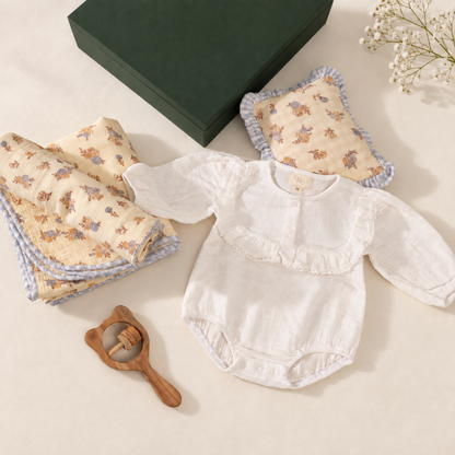 Beige bodysuit with delicate lace detailing and full sleeves.