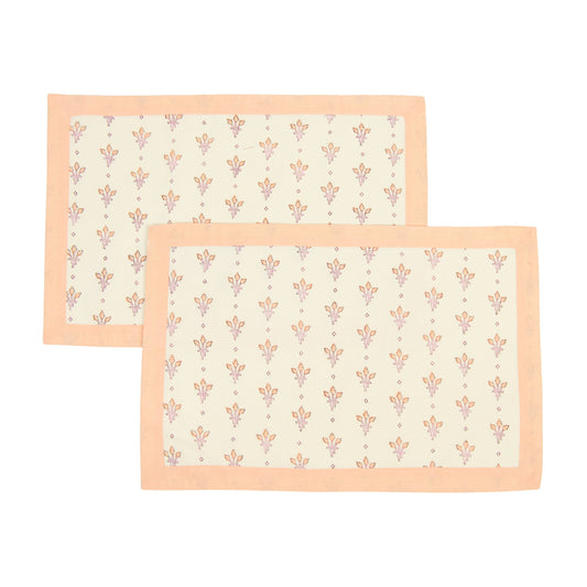 Two rectangular placemats with a floral pattern on a white background