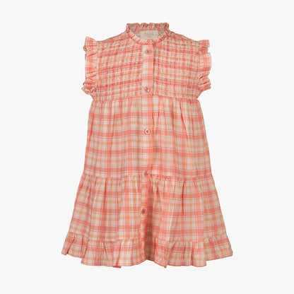 A sleeveless children's dress in a pink and white plaid pattern, featuring ruffled sleeves, a smocked bodice, and a tiered skirt with a ruffled hem.