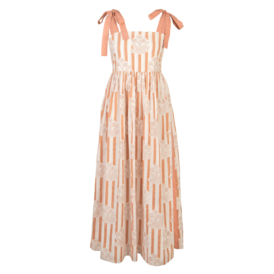Long dress with floral pattern and pink straps on a white background