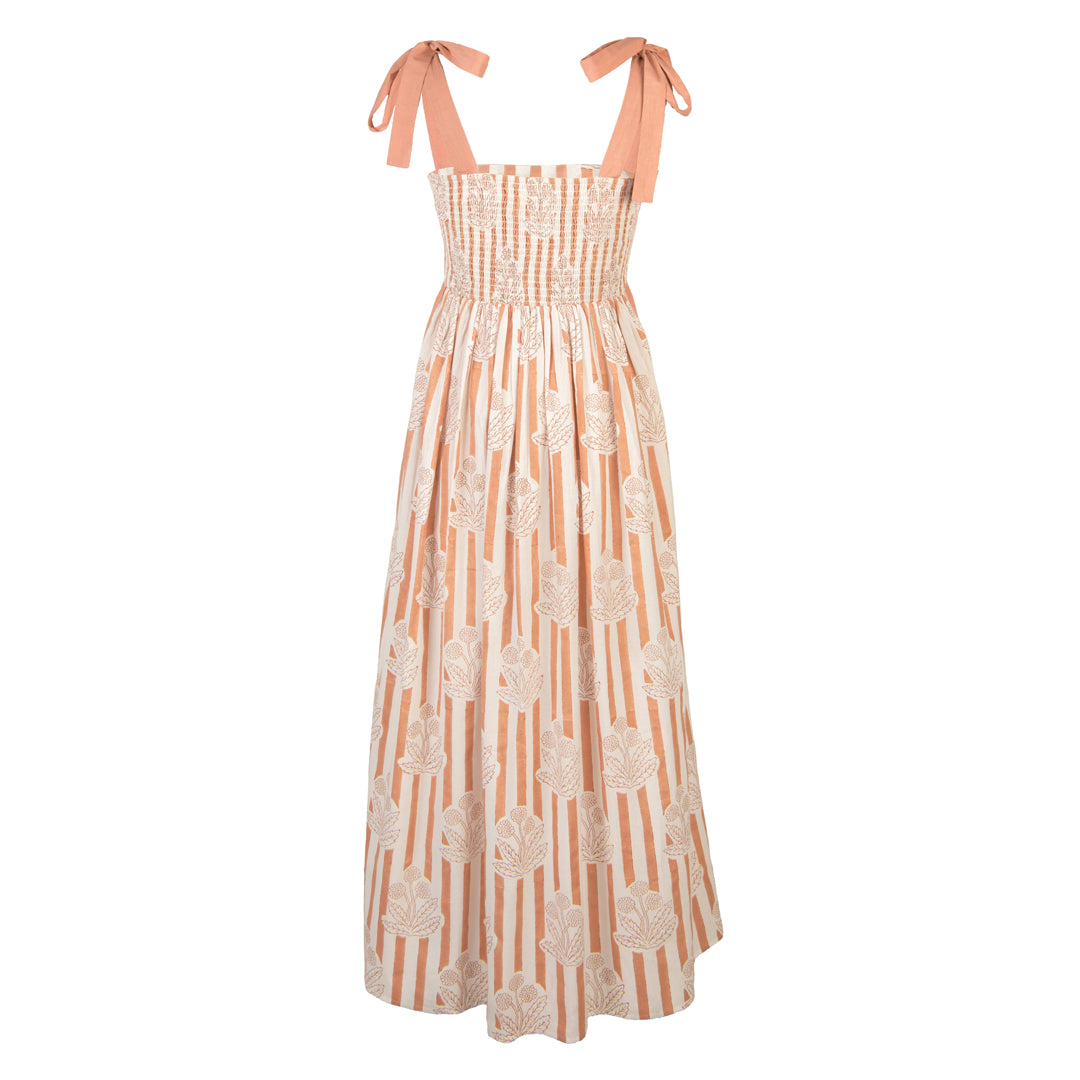 Long dress with floral pattern and pink straps on a white background