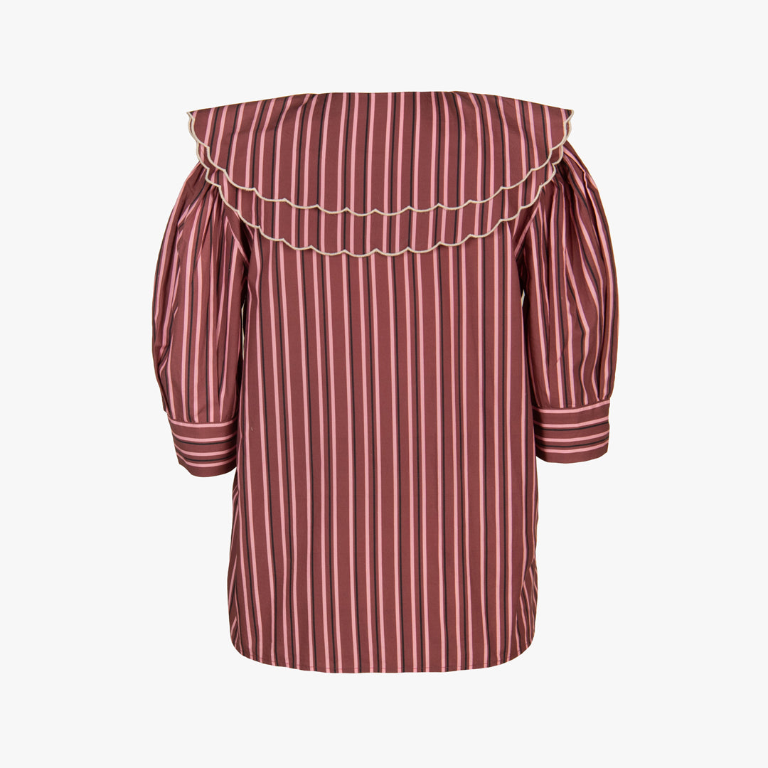 Red and white striped off-shoulder top on a light gray background