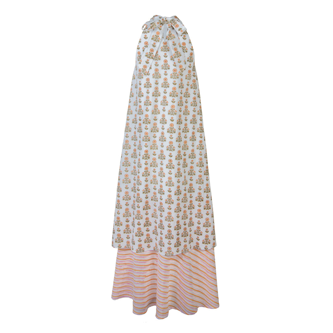 Long dress with floral top and striped skirt on a white background