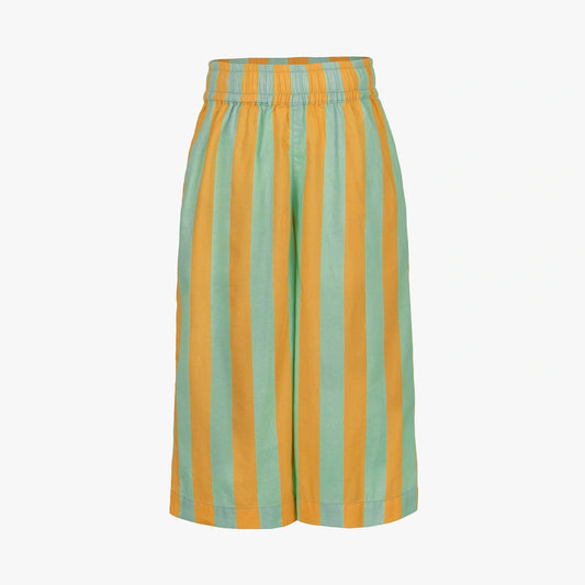 A pair of wide-leg shorts featuring vertical stripes in mint green and mustard yellow, displayed against a solid light gray background.