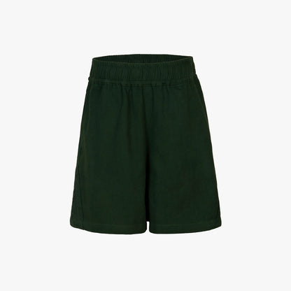 Dark forest green athletic shorts with an elastic waistband, shown against a plain light gray background.