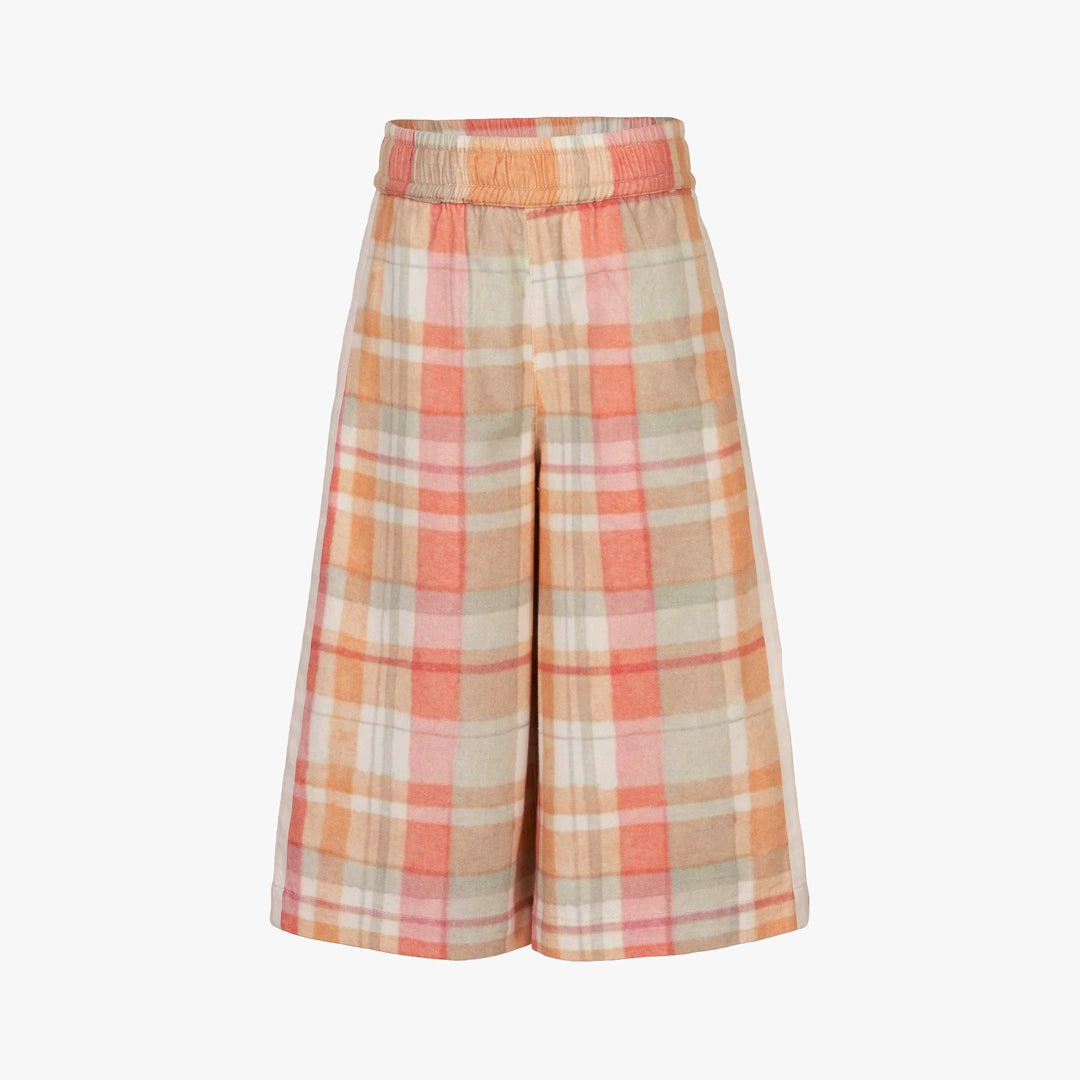 Plaid skirt with orange and beige pattern on a white background