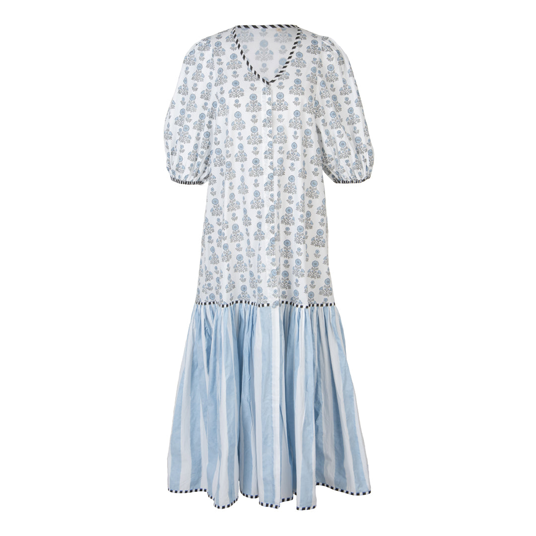 White dress with blue floral pattern on a white background