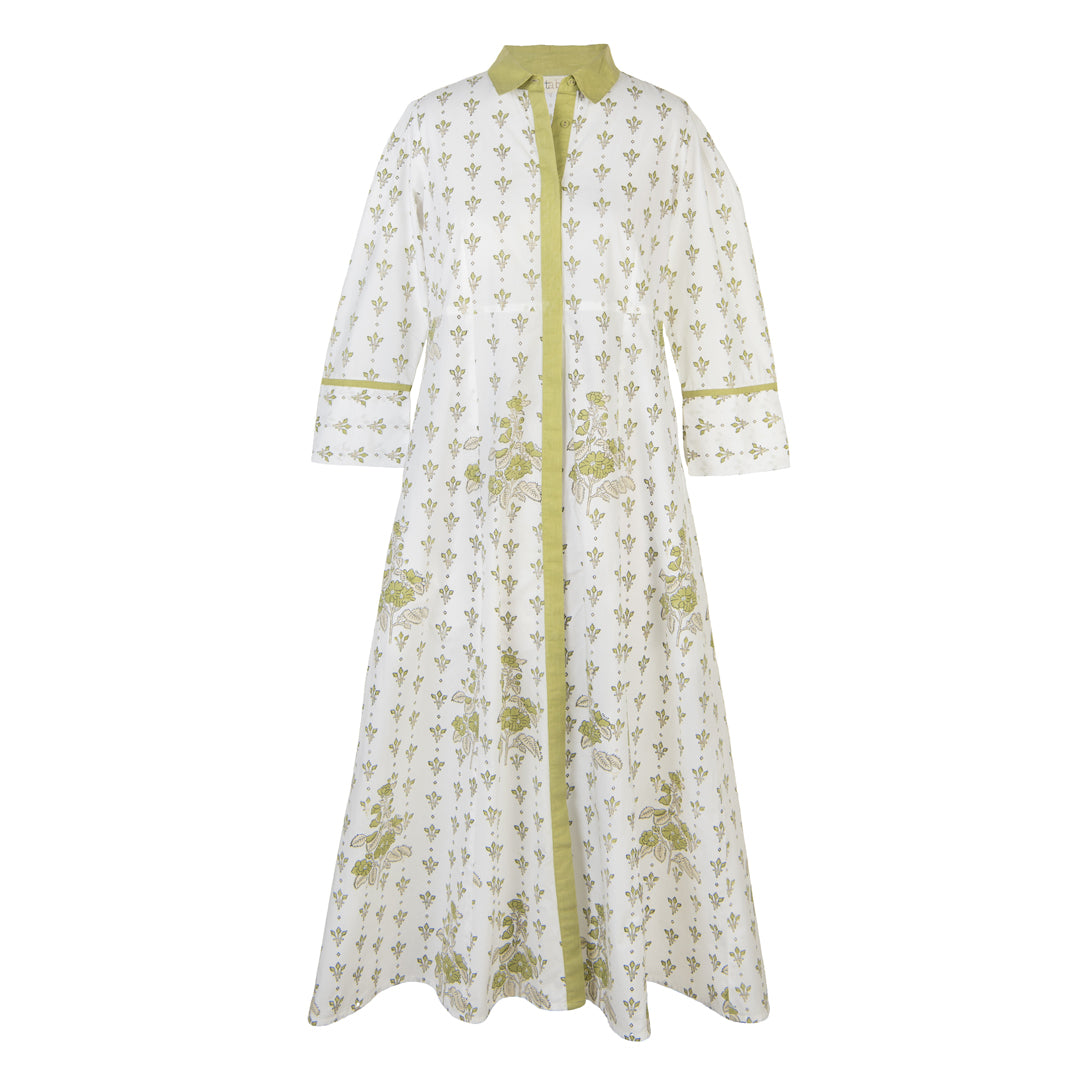 Long floral dress with green accents on a white background