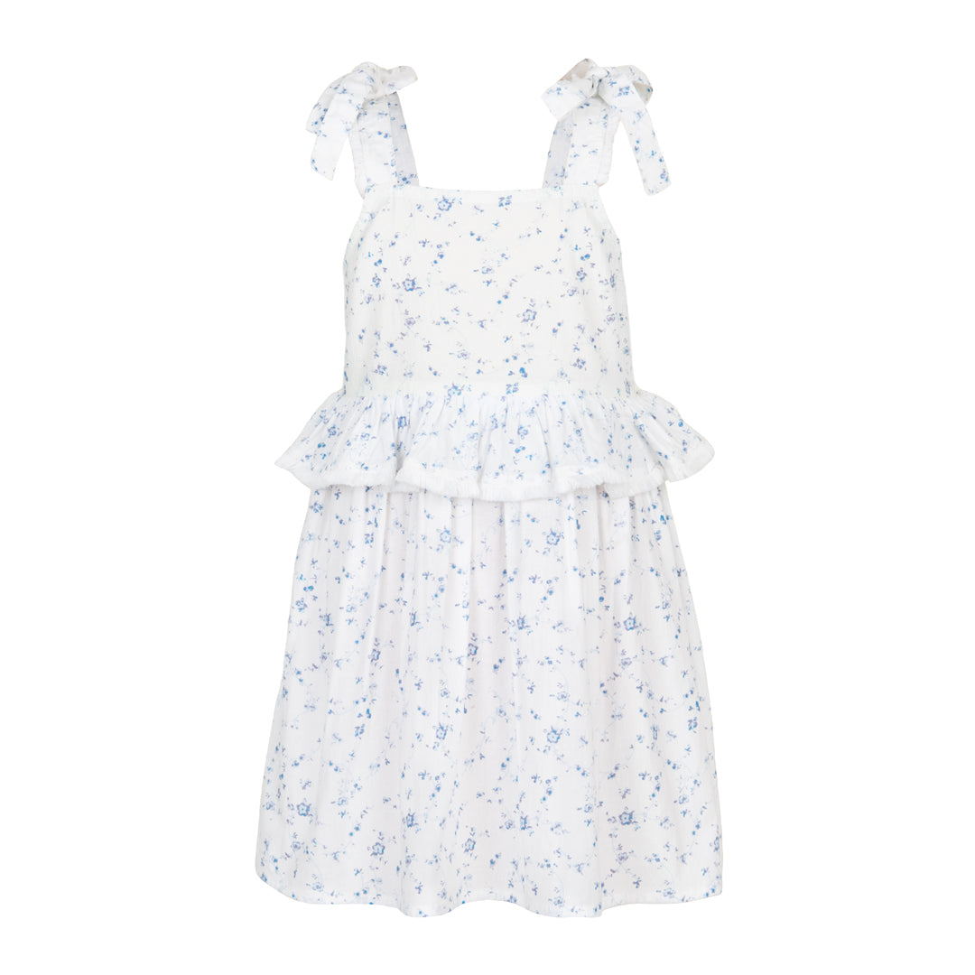 White dress with blue floral pattern on a white background