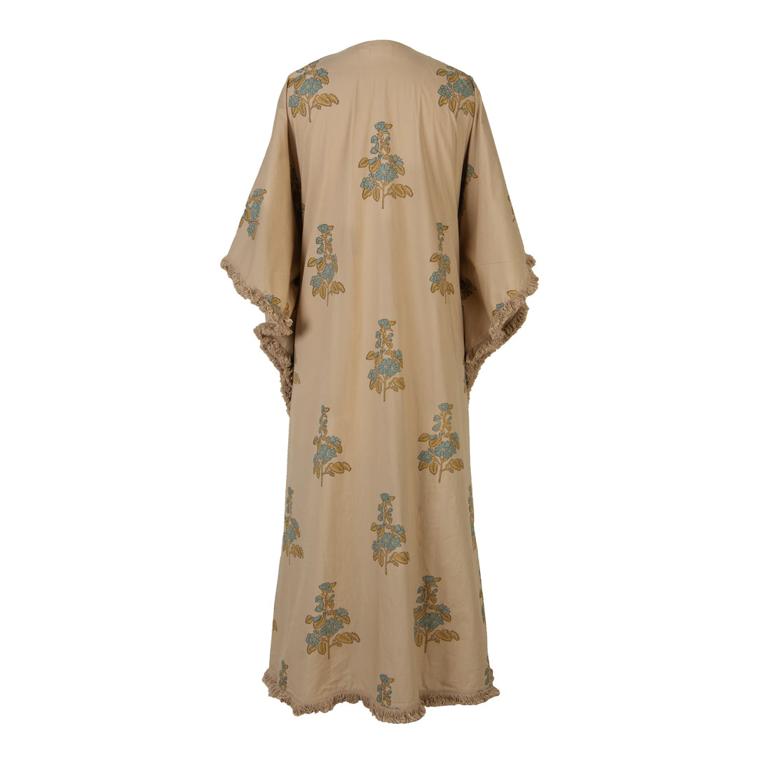 Beige dress with floral patterns on a white background
