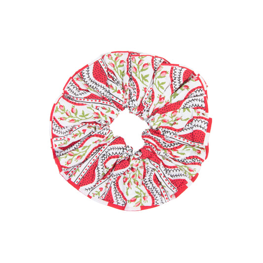 Red and white patterned scrunchie on a white background