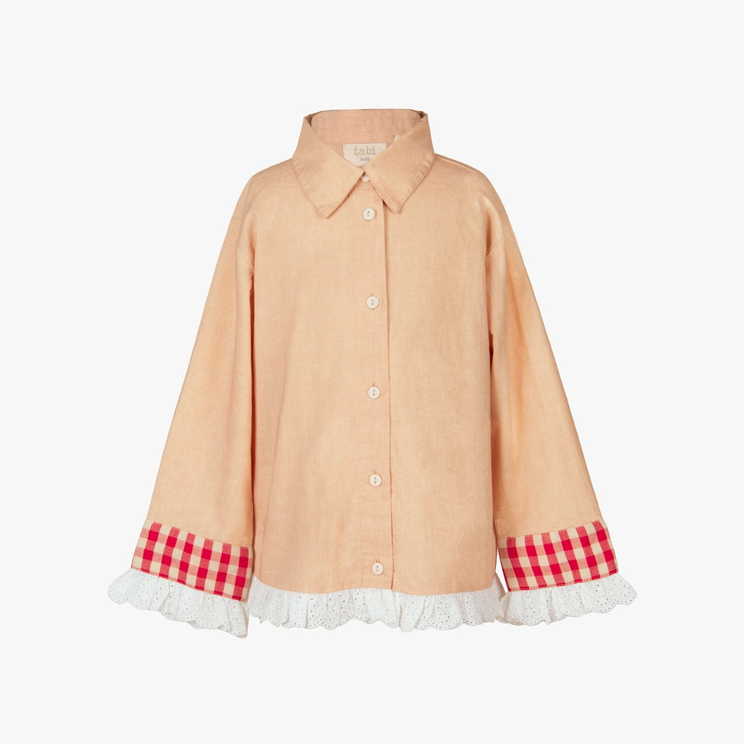 A peach-colored long-sleeve button-up shirt with red and white gingham cuffs and white lace ruffles, shown against a plain white background.