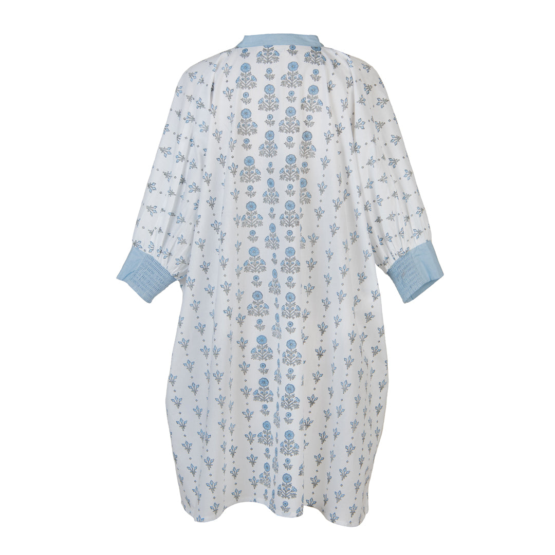 Baby sleeping bag with blue floral pattern on a white background