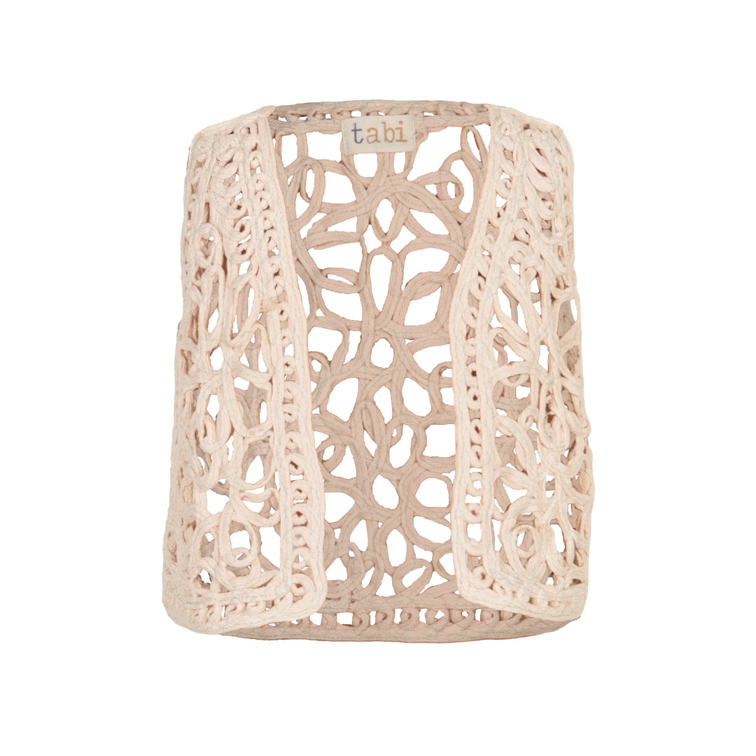 Decorative beige woven basket with 'tabi' branding on a white background