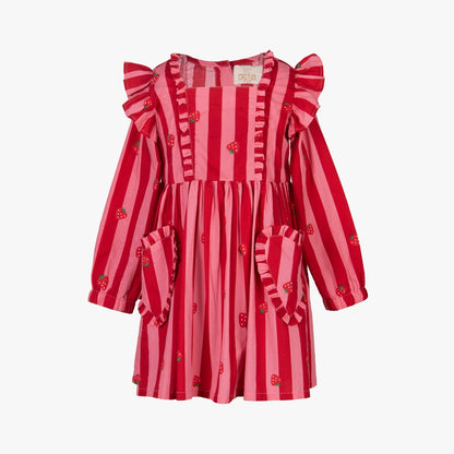 A red and pink striped long-sleeve dress with ruffled details, strawberry motifs, and front pockets, shown on a plain light gray background.