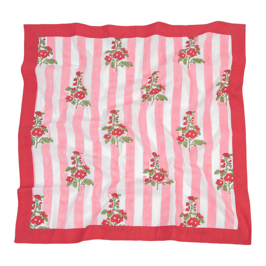 Scarf with pink and white stripes and floral patterns on a white background