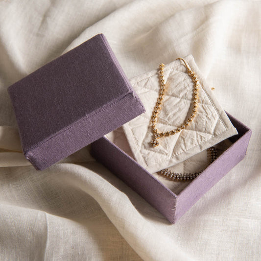 Aira storage boxes in amethyst smoke linen