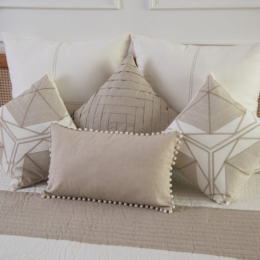 Dhari natural linen cushion cover with pompoms