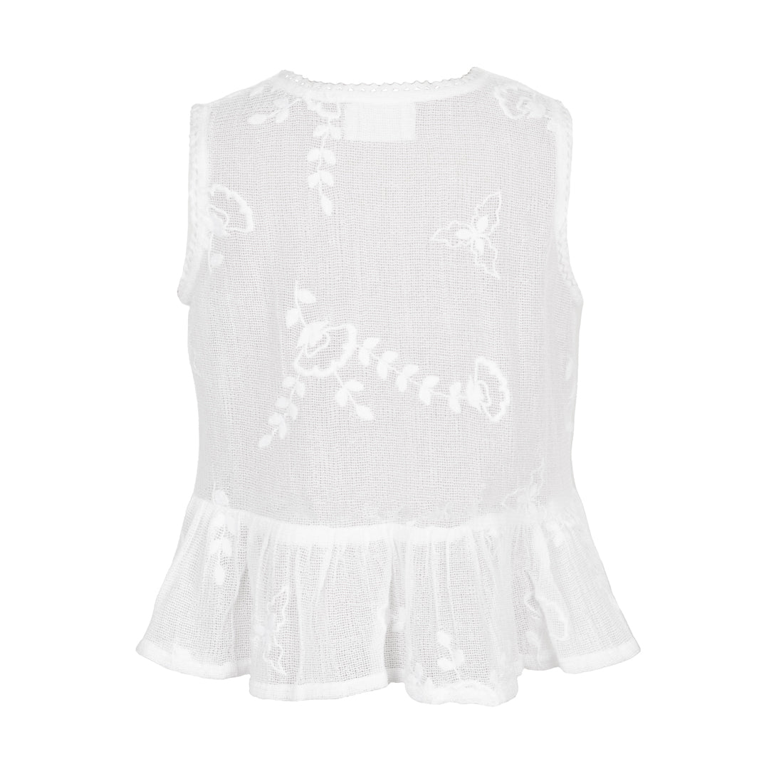 White sleeveless top with ruffled hem on a white background