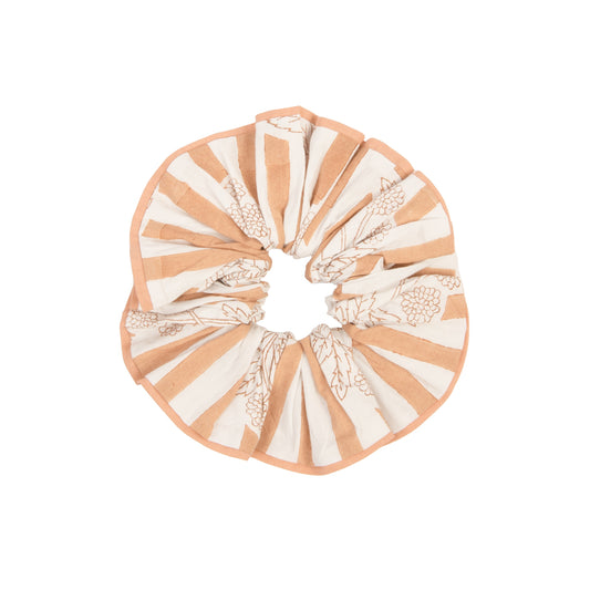 Round scrunchie with striped pattern on a white background