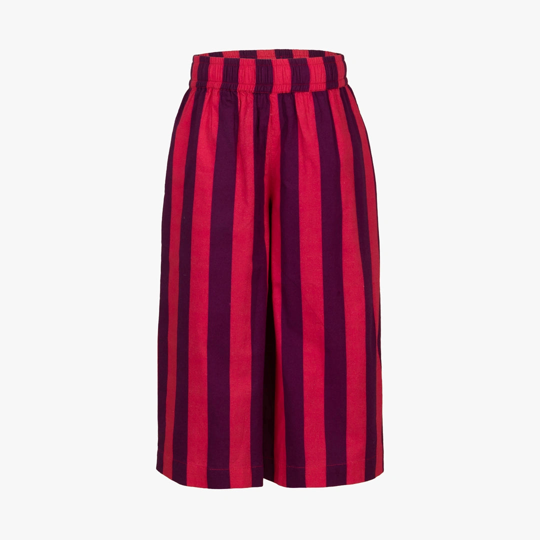 A pair of high-waisted shorts featuring bold vertical stripes in vibrant magenta pink and deep purple, displayed against a clean white background.
