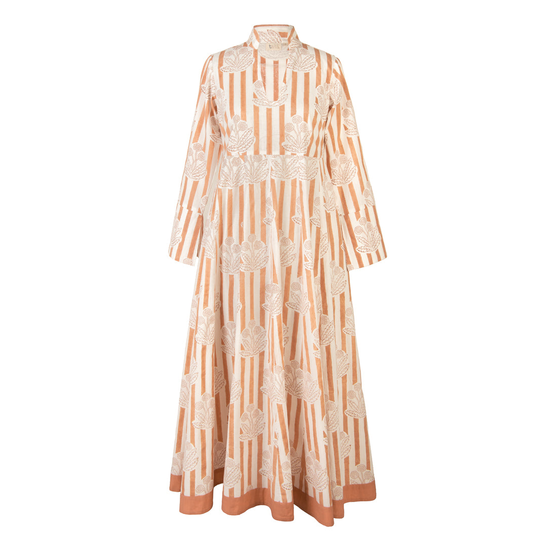 Long dress with orange and white pattern on a white background