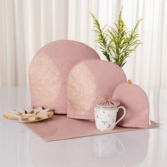 Dusty rose linen tray mat, tea cosy and glass cover