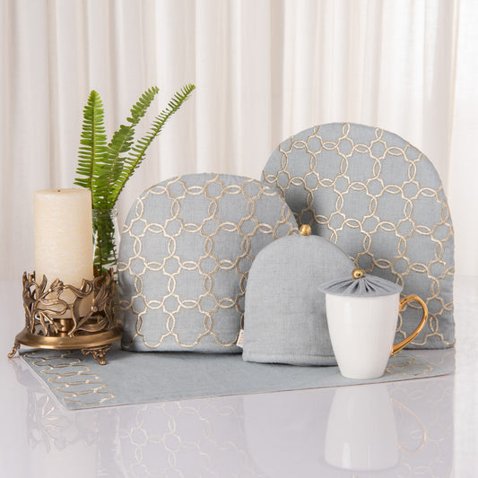 Aqua grey linen tray mat, tea cosy, milk cosy and glass cover
