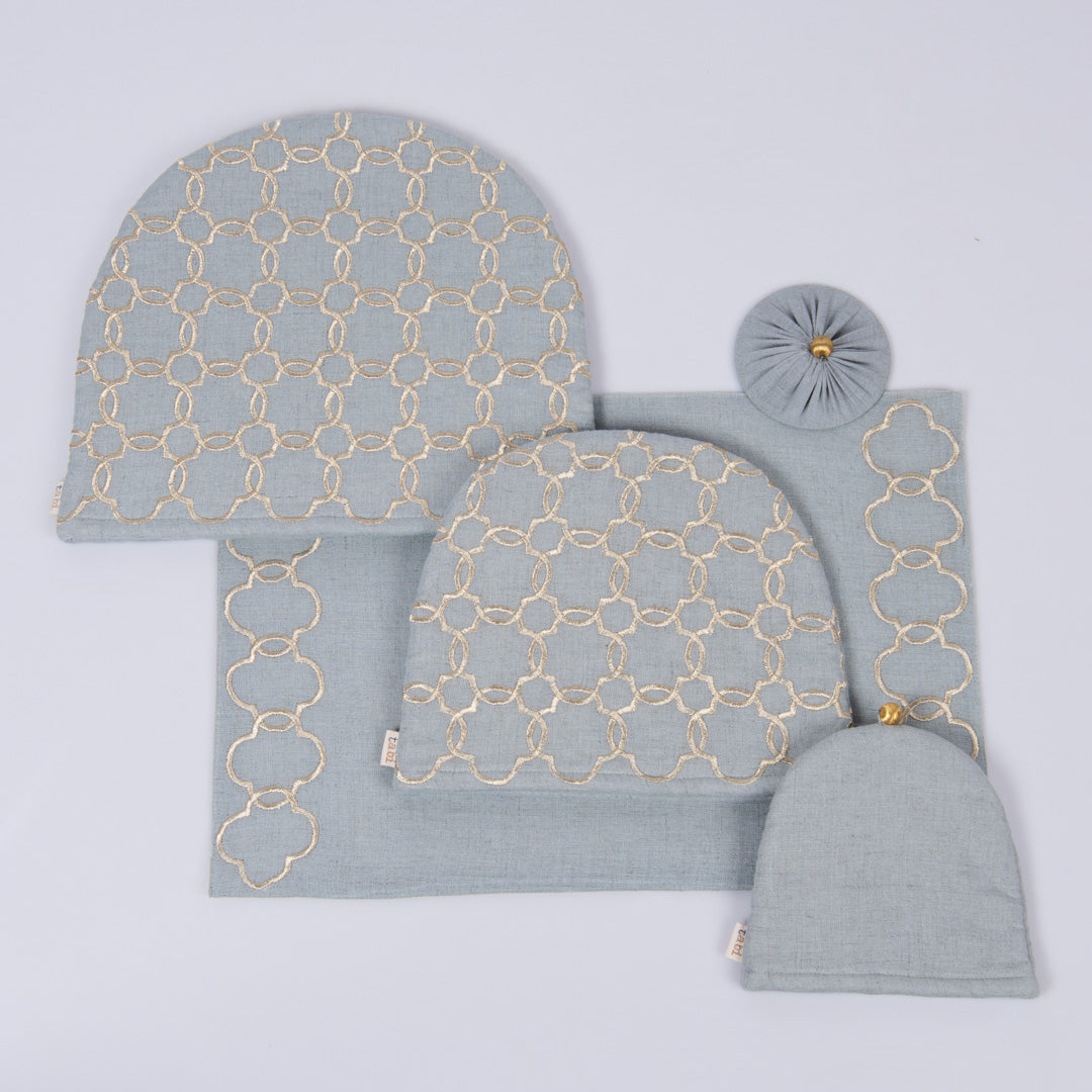 Aqua grey linen tray mat, tea cosy, milk cosy and glass cover