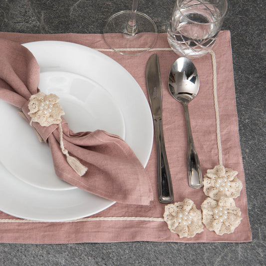 Dusty rose linen table mats with crochet detailing