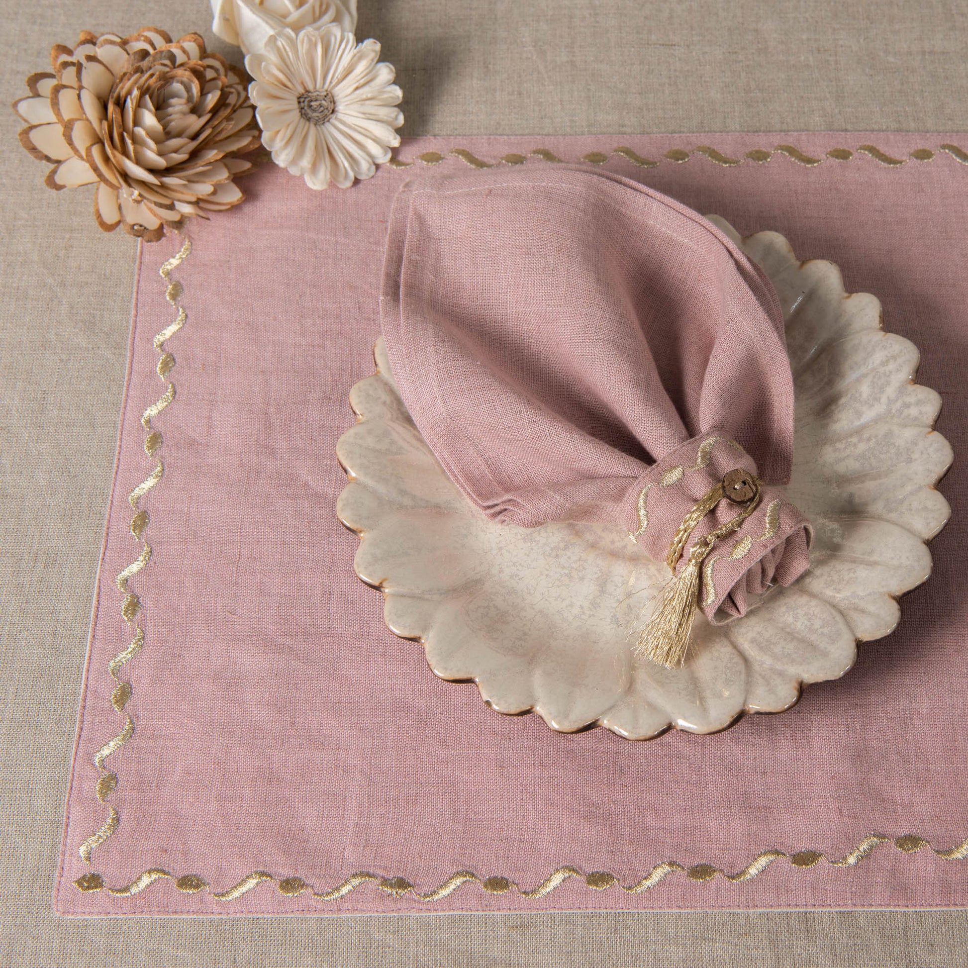 Gold embellished dusty rose linen napkin rings