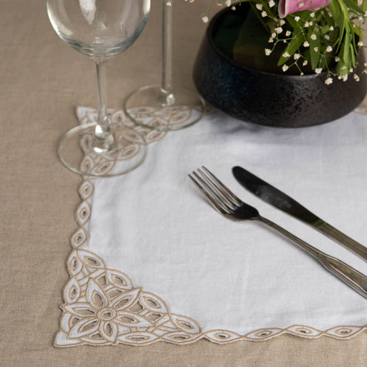 Cutwork edged white linen table mats