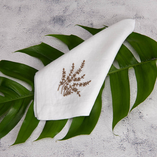 Embroidered white linen napkins