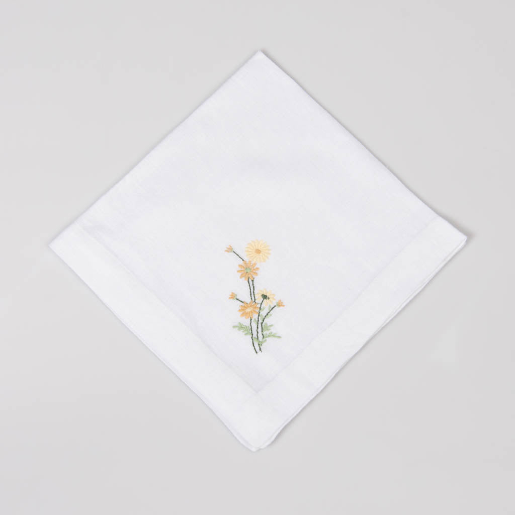 Embroidered white linen napkins