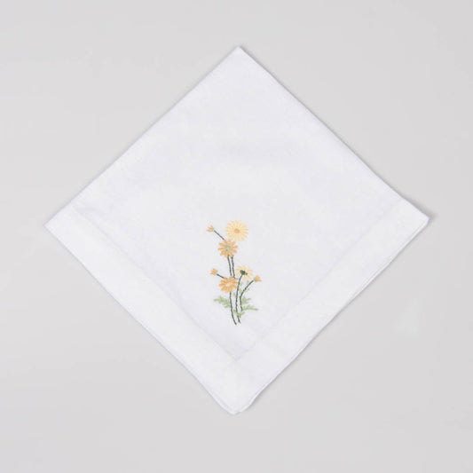 Embroidered white linen napkins