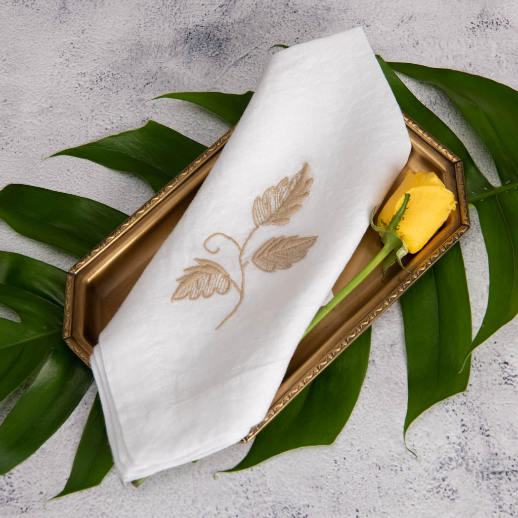 Embroidered white linen napkins