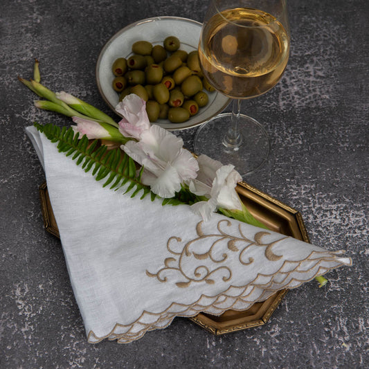 Embroidered white linen napkins