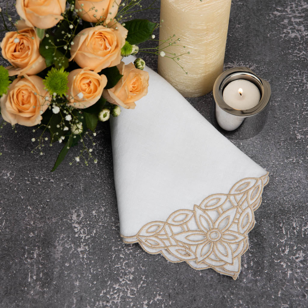 White linen dinner napkins with cutwork